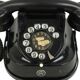 Old black telephone with rotary dial metal Bakelite RTT 56B