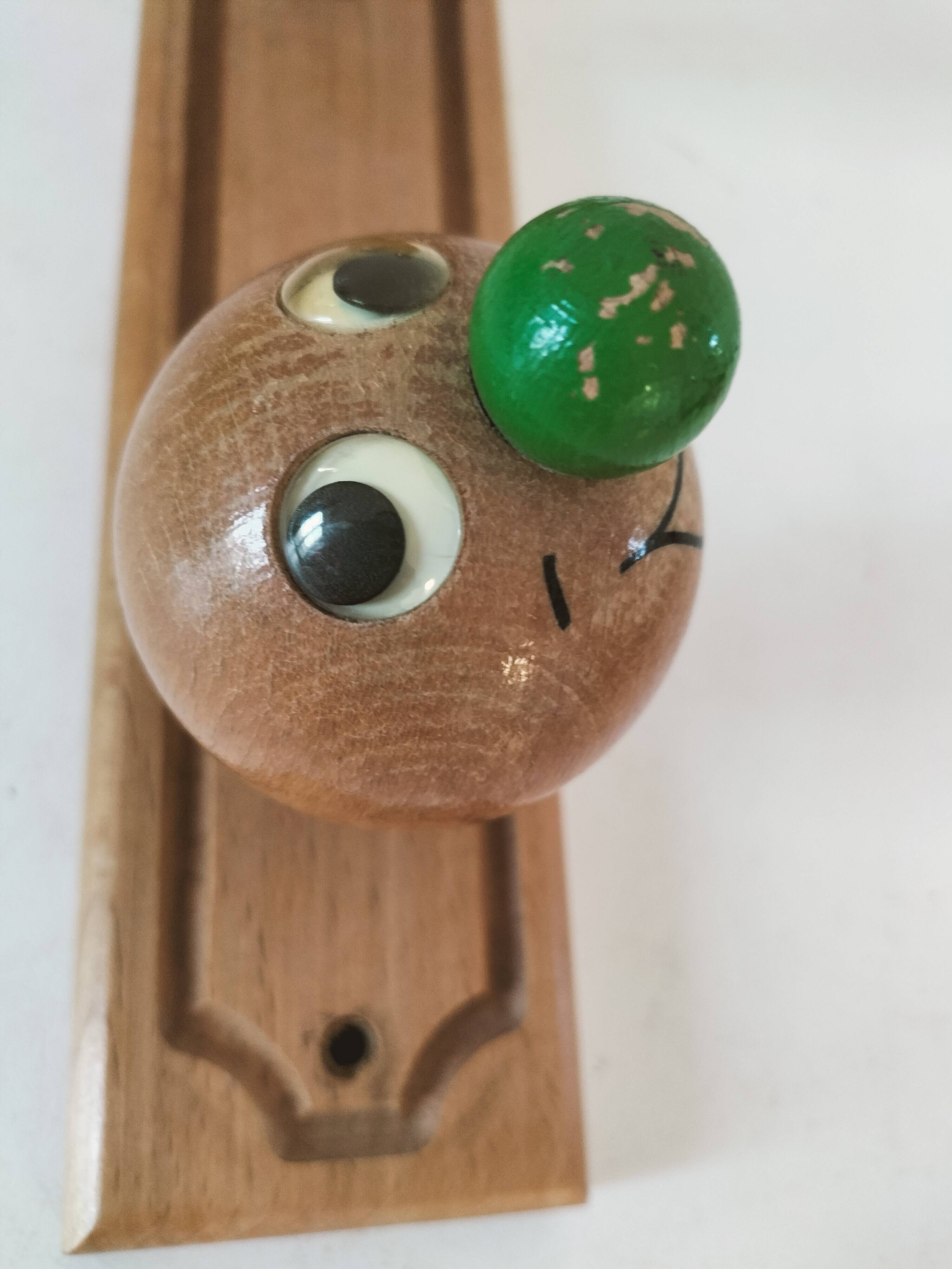 Vintage wooden children's coat rack - smiling heads hooks