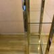 Silver and gold metal shelf, from the 80s.