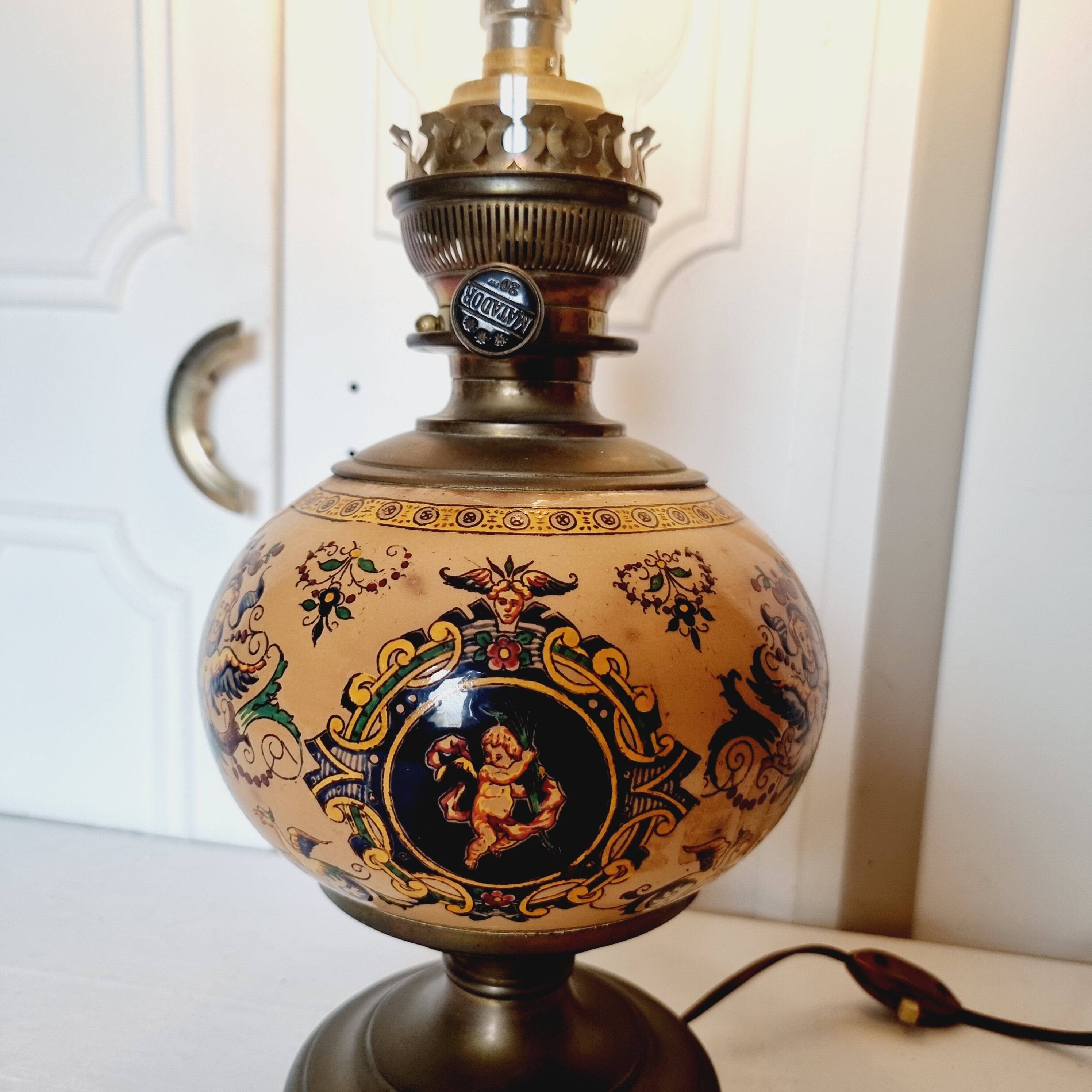 Electrified oil lamp in bronze and hand-painted Gien earthenware