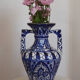 White hand-painted ceramic vase with blue patterns