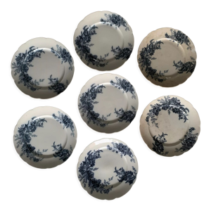 Ensemble de sept assiettes plates