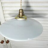 Hanging in opaque white glass.