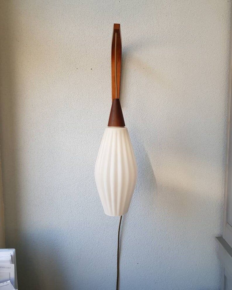 Wall lamp with white glass