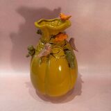 Yellow vase decorated with birds