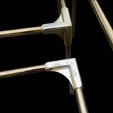 Trio of nesting tables in gold, smoked safety glass, 1970s