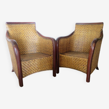 Set of 2 armchairs in woven rattan and exotic wood, 1980s