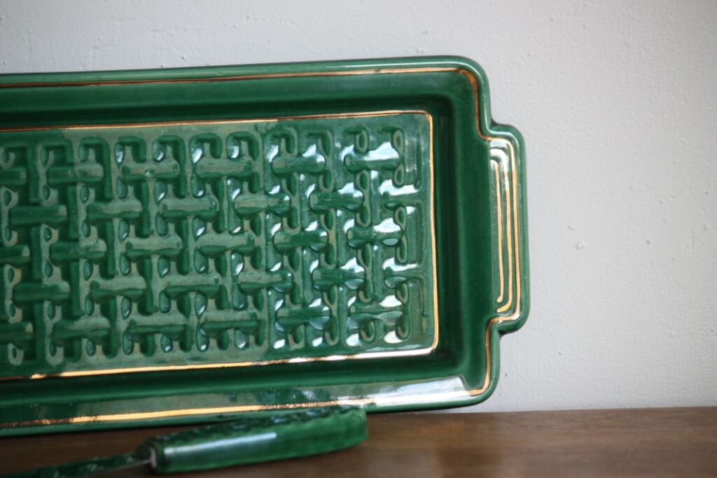 Green and gold ceramic dish