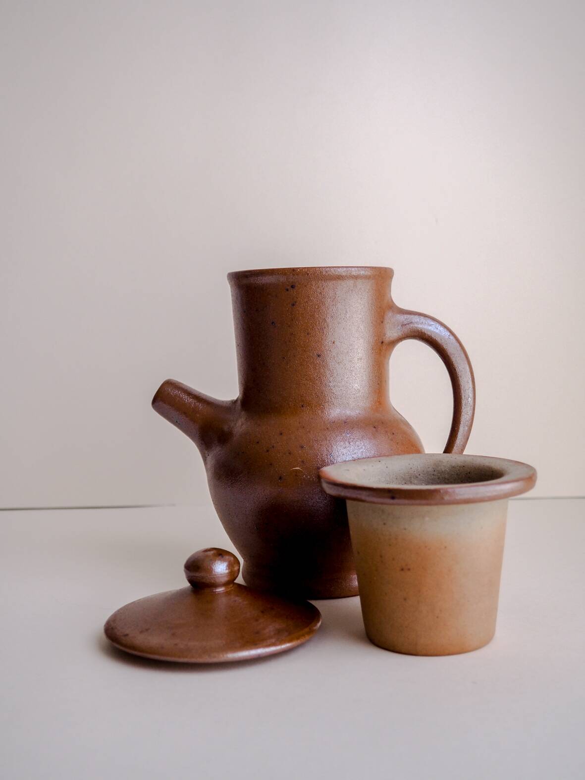 Handcrafted stoneware teapot with strainer