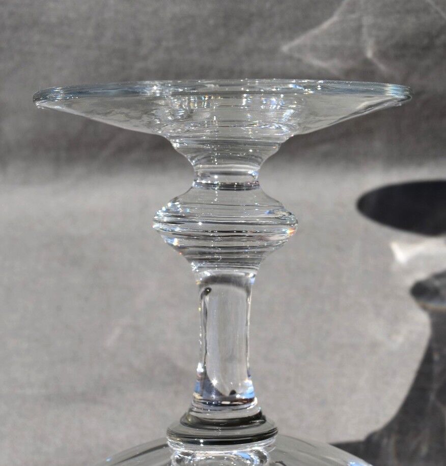 9 old champagne glasses in flat-waisted blown glass