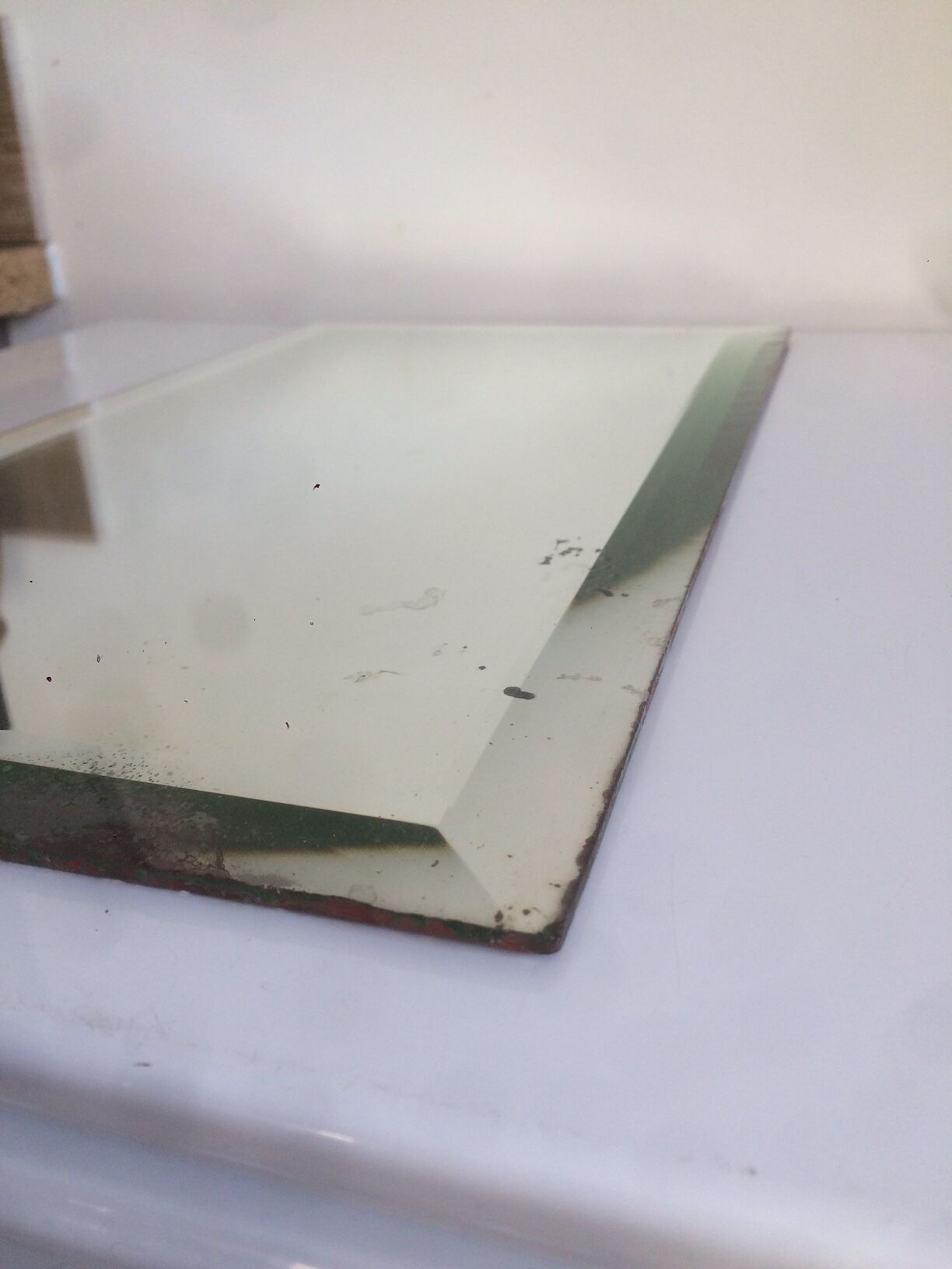 Old bevelled mirror 51x27,5cm