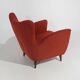 Pair of red armchairs with cone-shaped feet, 1950s
