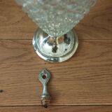 Old ewer in crystal and silver metal