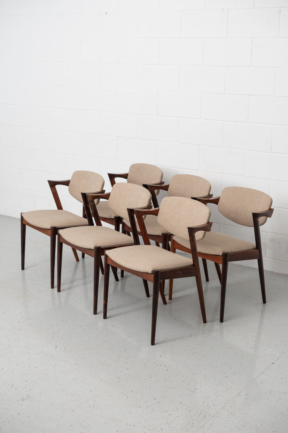 Dining chairs in rosewood, model 42, by Kai Kristiansen.