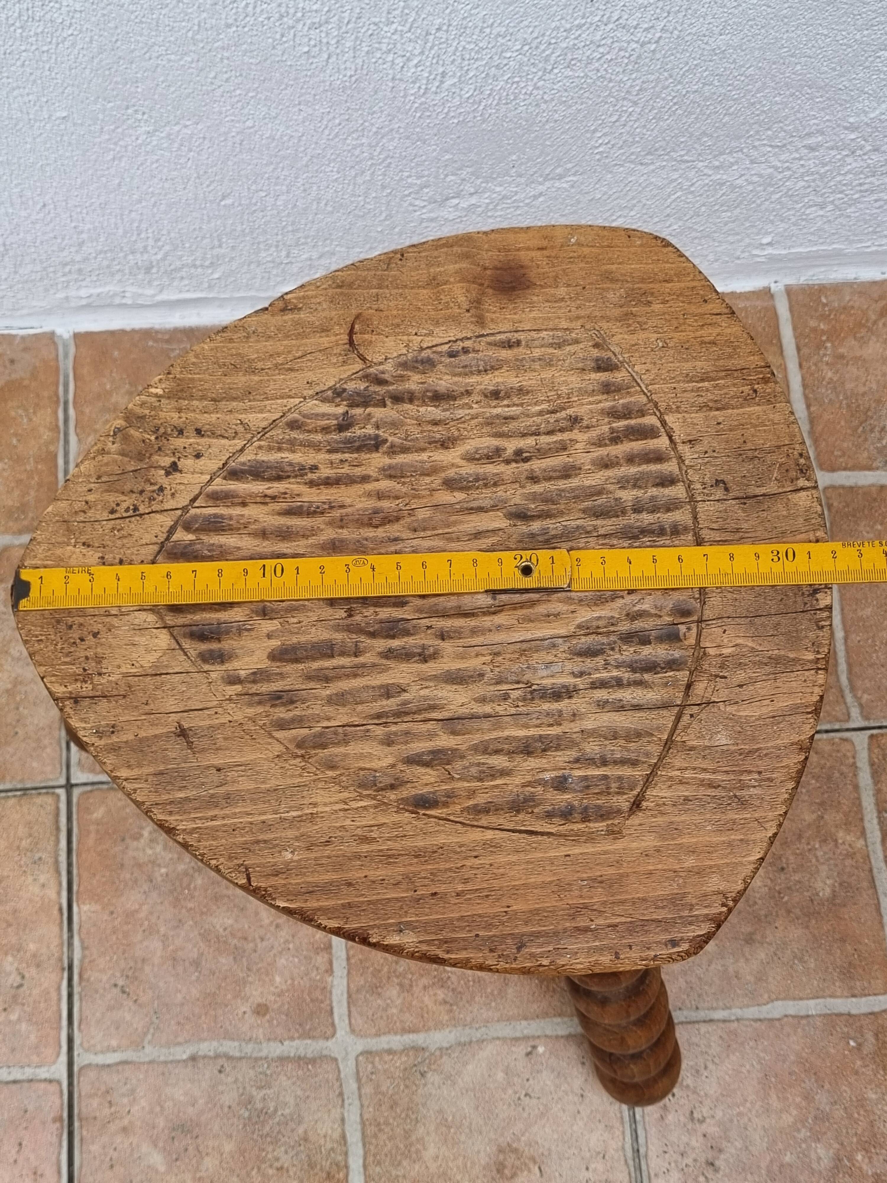 Rustic solid wood tripod stool with turned legs, 45 cm high