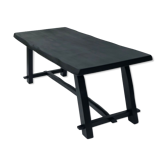 Black brutalist wooden table