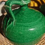 Green enamelled sandstone jug