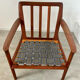 Old Scandinavian design armchair in vintage teak year 60