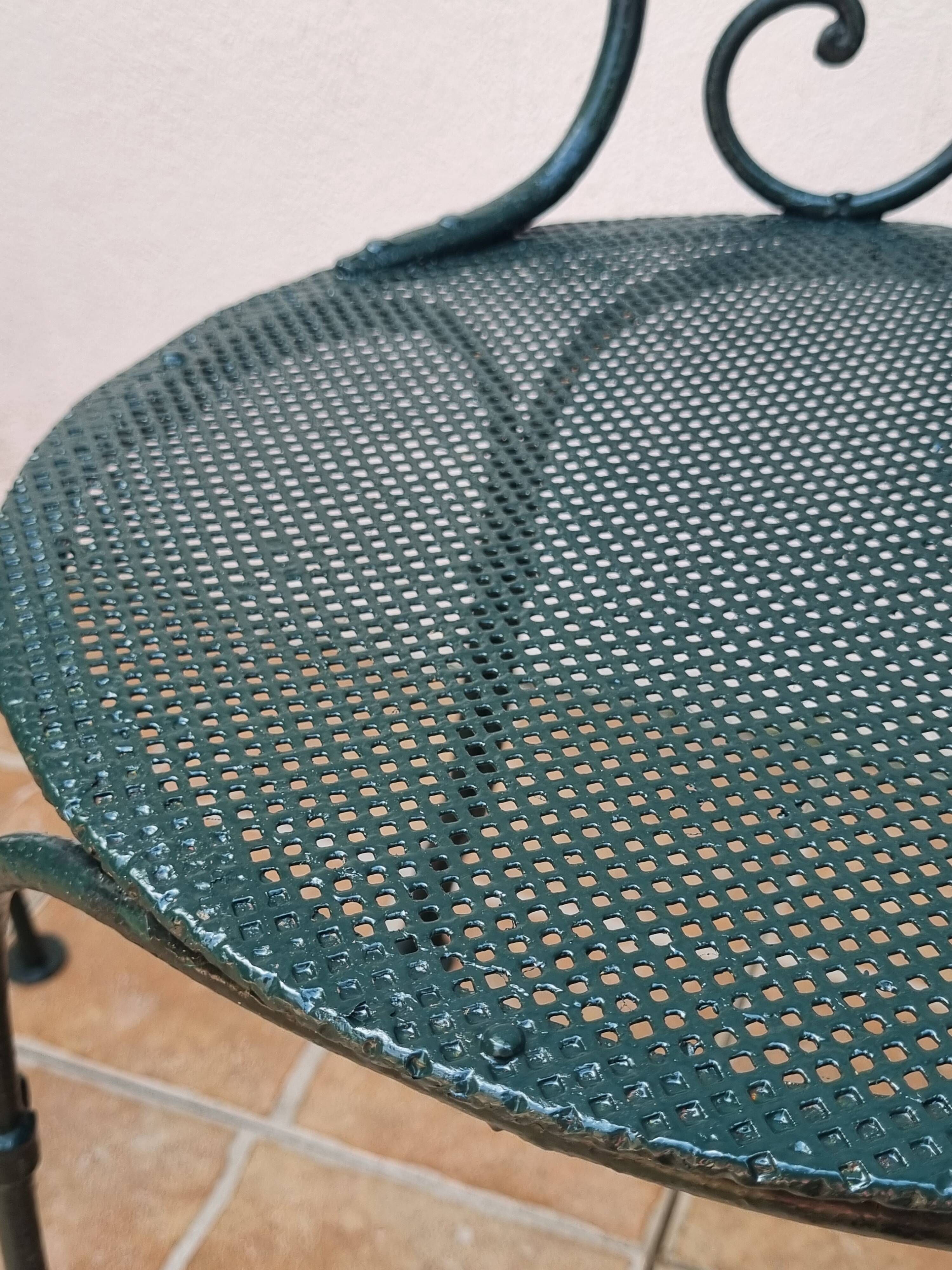 Set of 4 antique garden chairs in wrought iron from 1900.