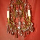 Bronze and crystal chandelier with 4 arms from the early 20th century