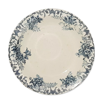 Hollow dish of the earthenware factory of Choisy le Roi model Floreal, iron earth.