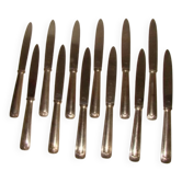 12 couteaux de table en métal argenté et inox, début XXème