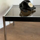 Grande table basse design années 70 chrome, verre fumé et skaï