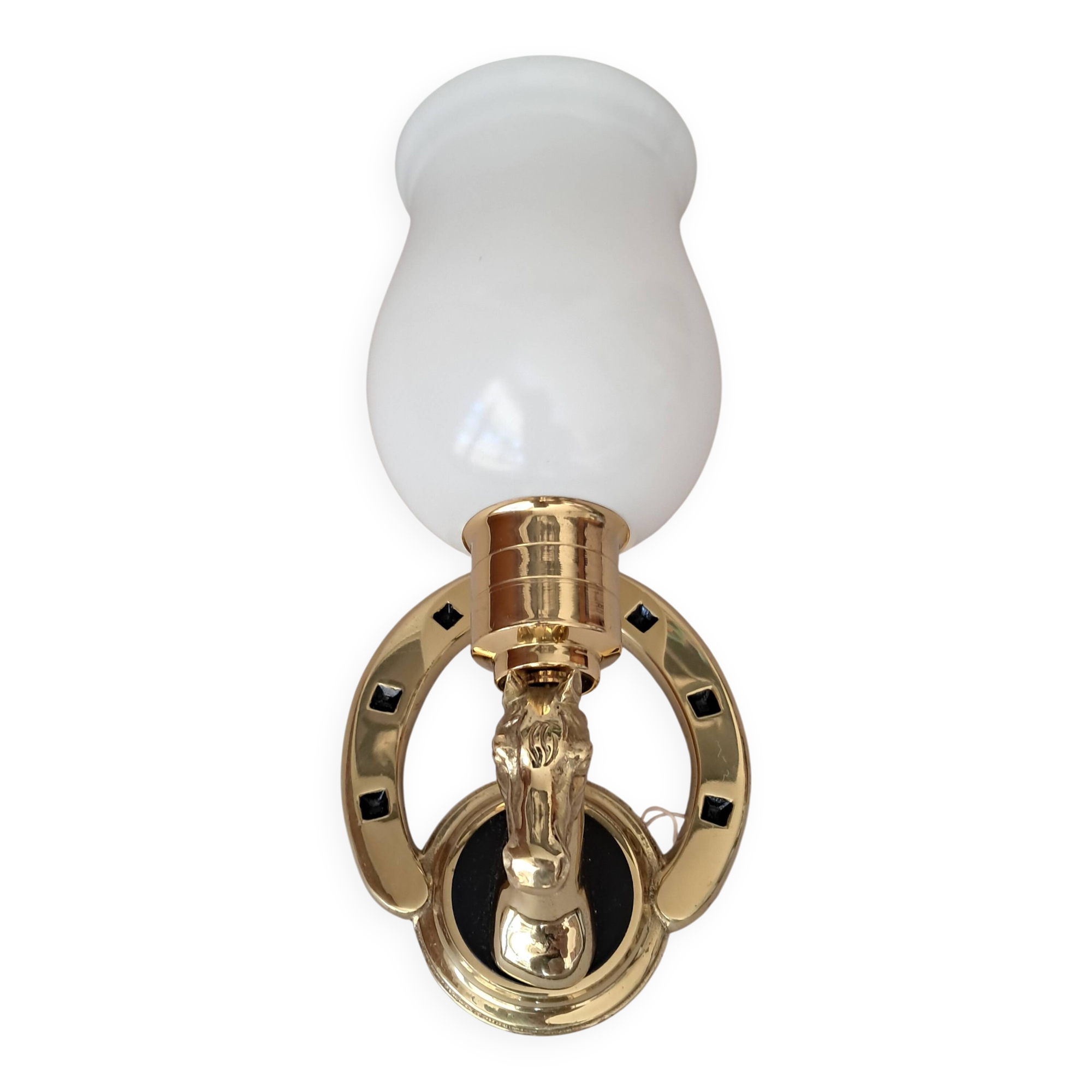 Gilded bronze wall lamp with iron and horse head 1950/1960.