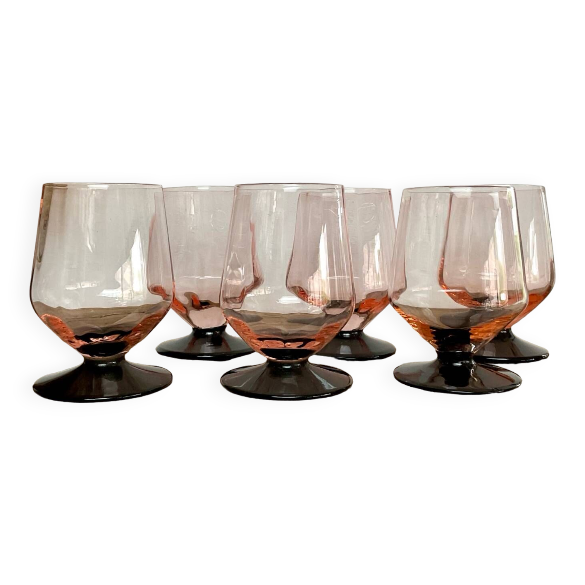 6 small pink glasses with black stem