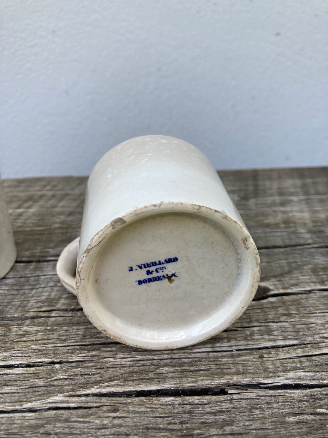 Duo of old beige Veillard Bordeaux coffee cups