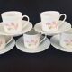 Set of five coffee cups and saucers, Limoges, Goumot Labesse