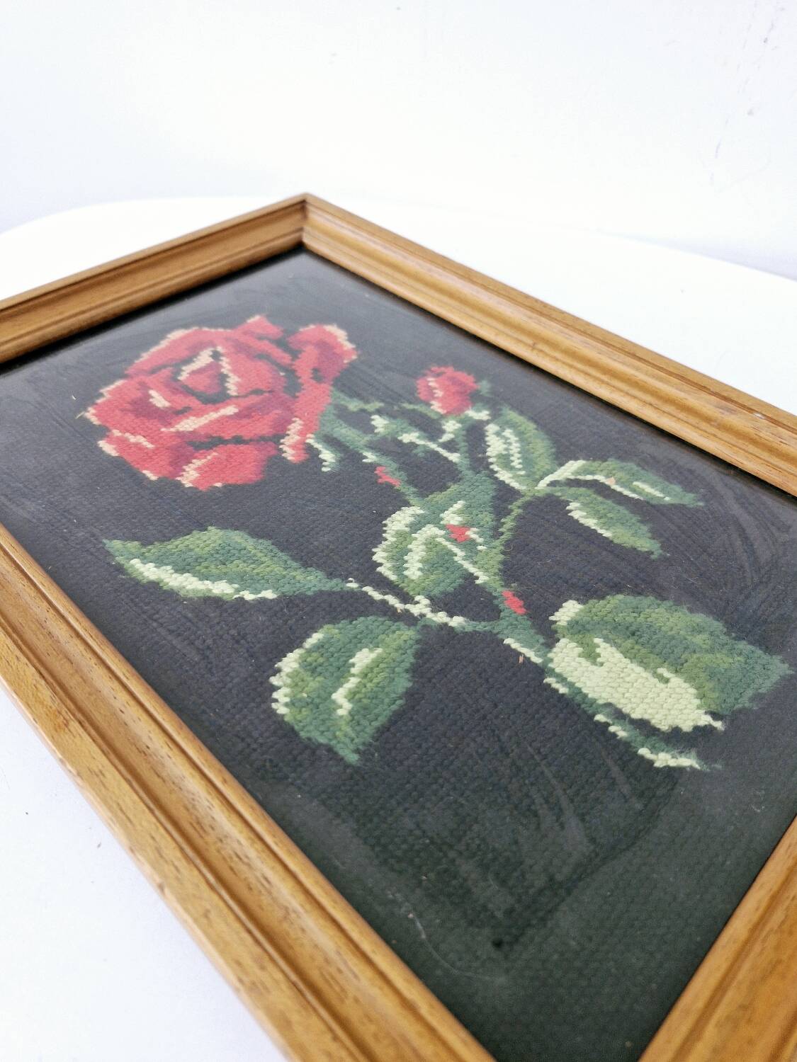 Canvas under vintage pink frame on black background