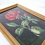 Canvas under vintage pink frame on black background