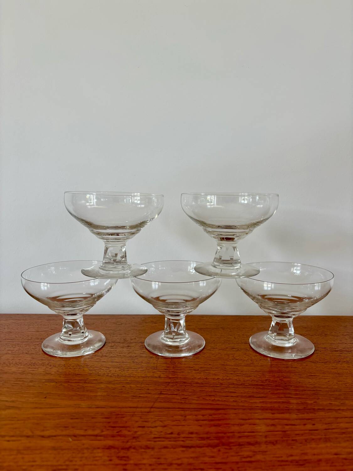 set of 5 crystal champagne glasses, worked and faceted feet, 1960
