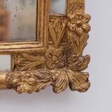Regency style beaded mirror in carved and gilded wood, early 19th century
