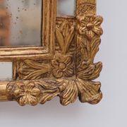 Regency style mirror with carved and gilded wood frame, early 19th century