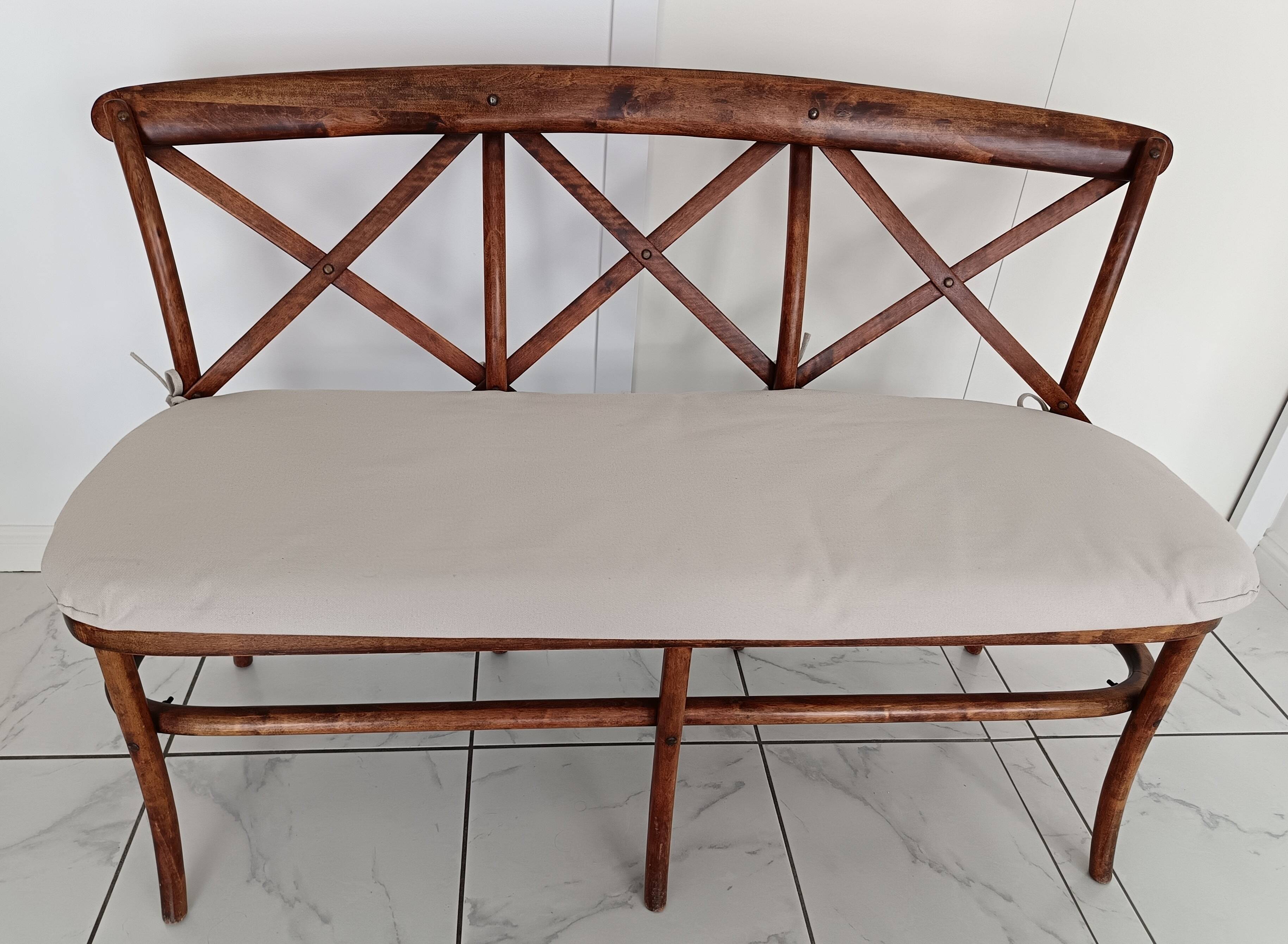 CURVED WOOD AND CANE BENCH