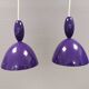 Two purple hanging lamps from Norway Says for Muuto, model Mhy