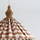 "Olga" pleated pendant light in terracotta check fabric and turned wood finish
