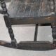 Vintage brown solid wood rocking chair, 1950s, flat backrest and turned legs.