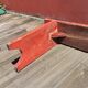 Banc ancien en bois peint en rouge