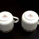 Two PL coffee cups (Limousine Porcelain) the crowned swallow