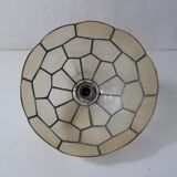 Mother-of-pearl and brass suspension