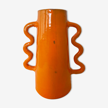 Handmade abstract orange ceramic vase with wavy handles