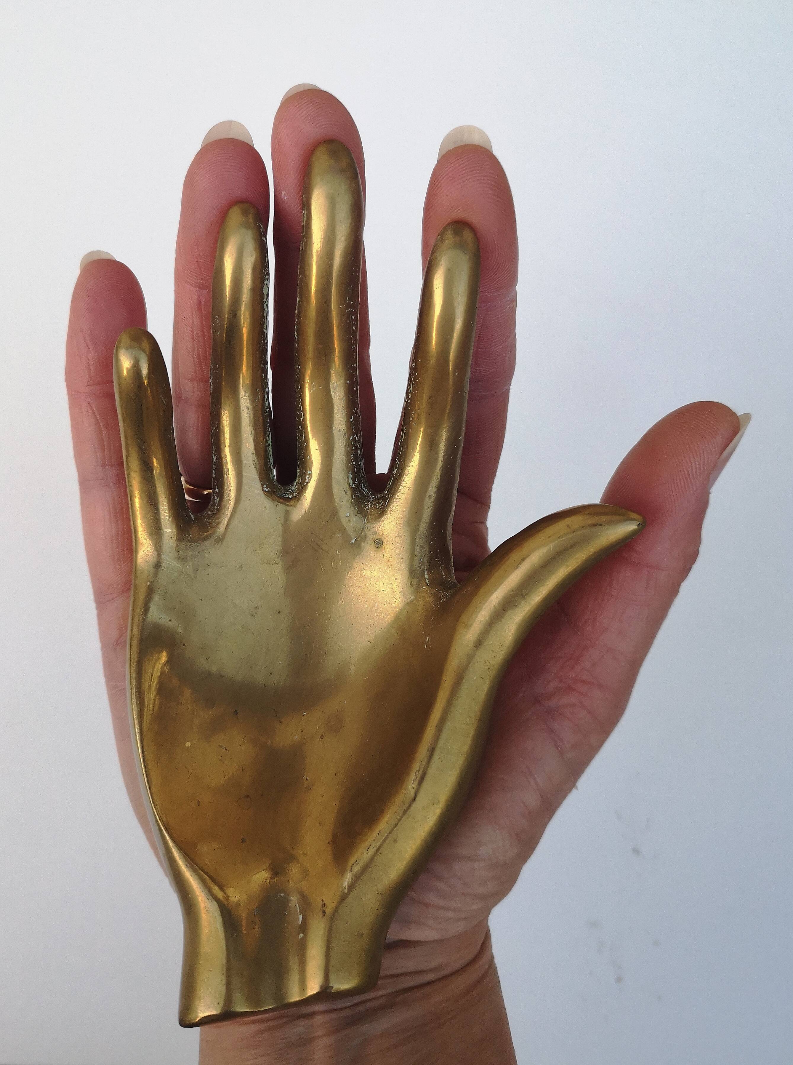 Hand, vintage ashtray, bronze