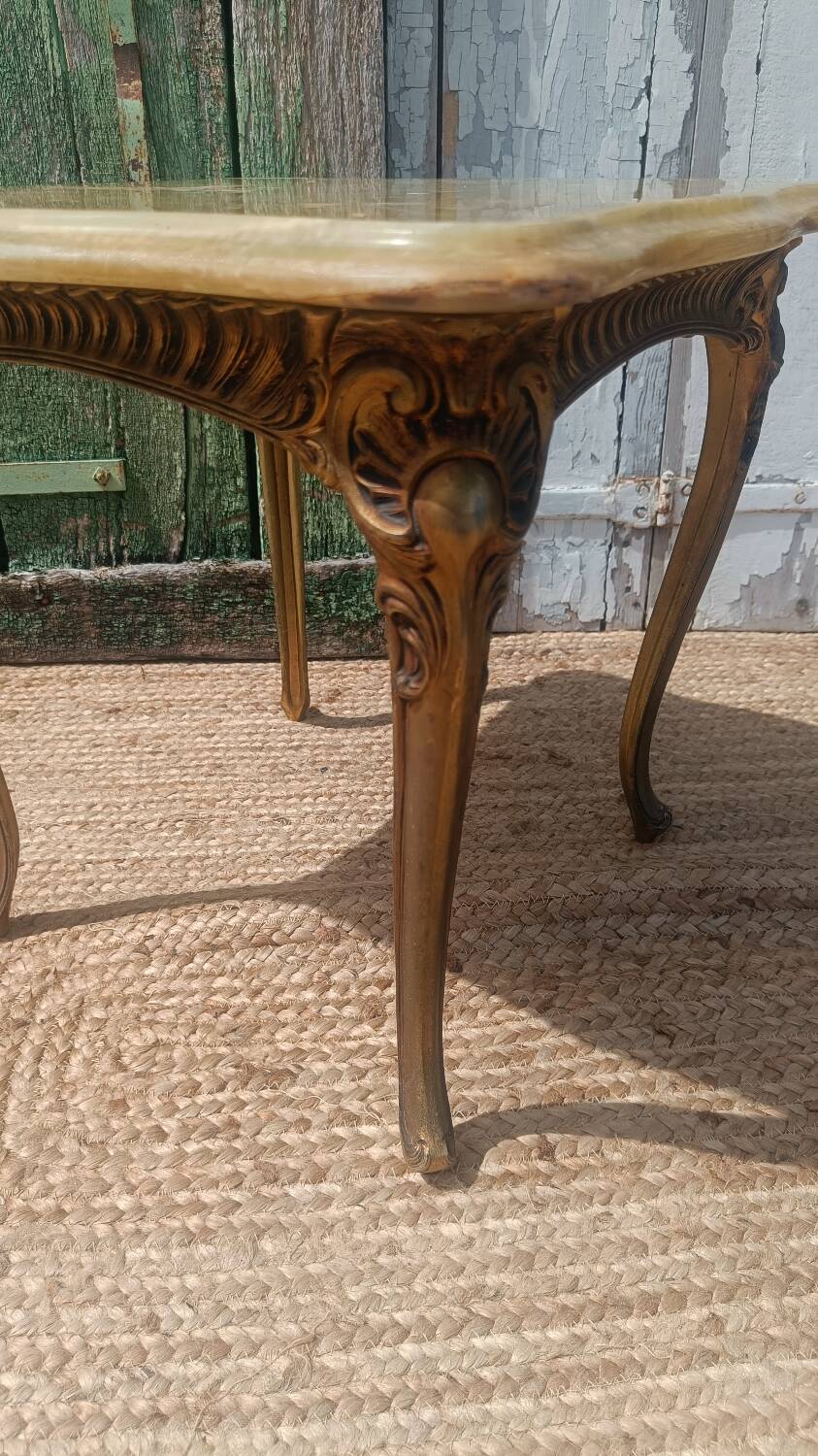 Vintage side table in gilded brass with an onyx top.