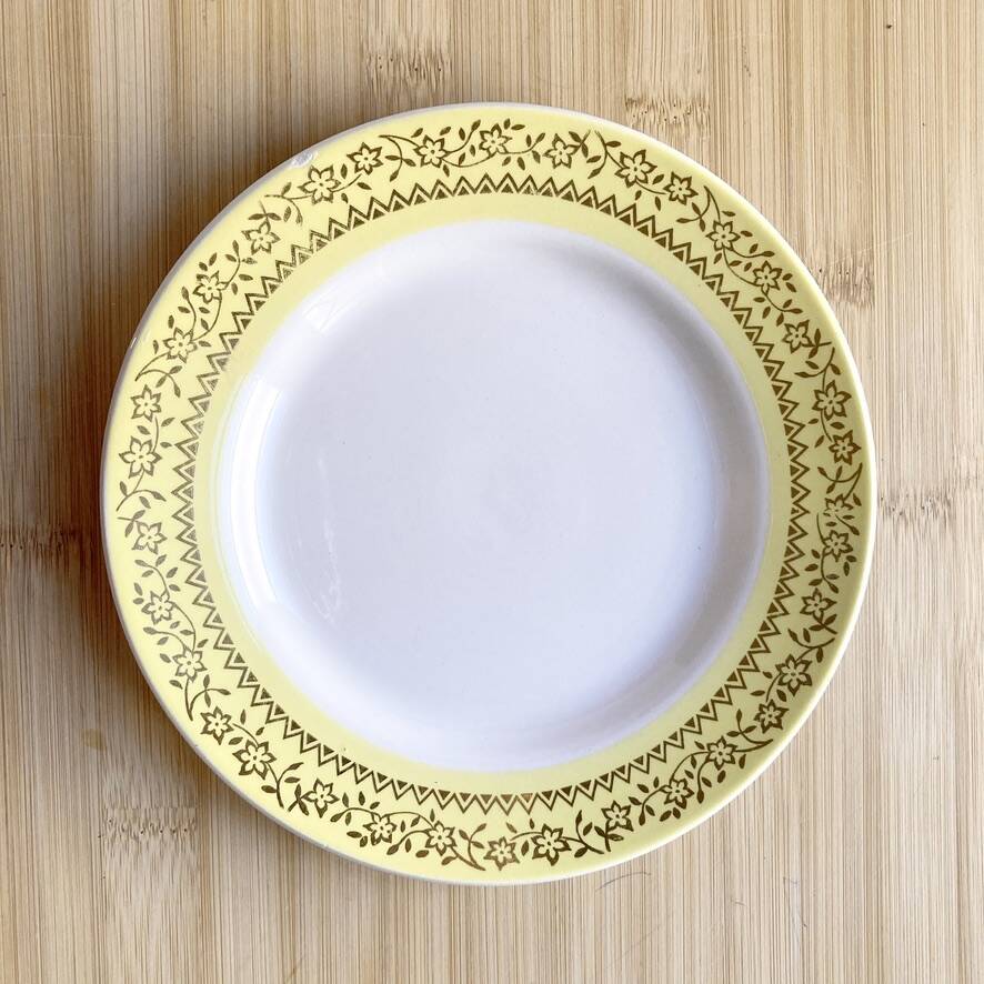 8 vintage yellow dessert plates
