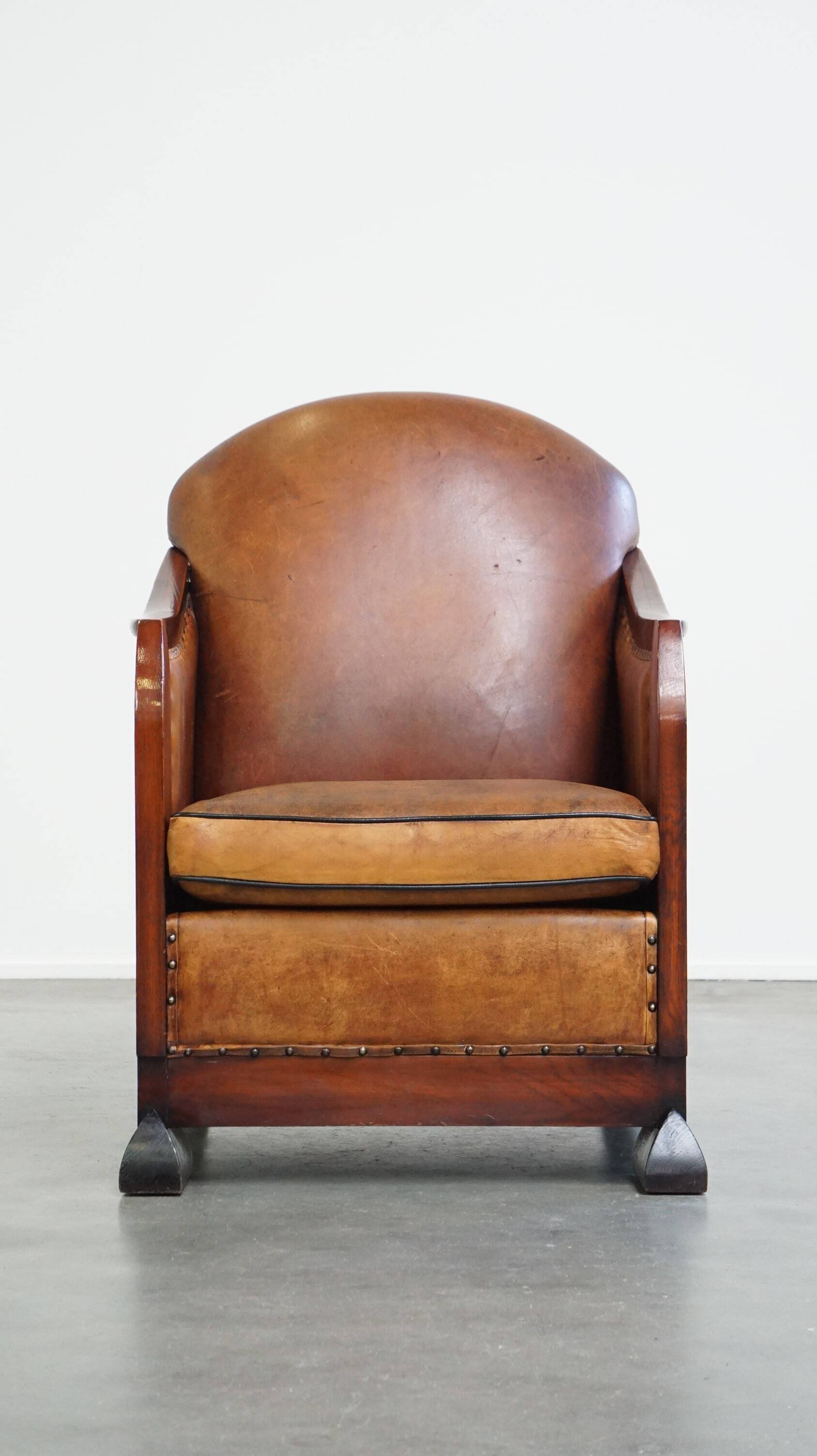 Unique, stately, comfortable sheepskin Art Deco design armchair
