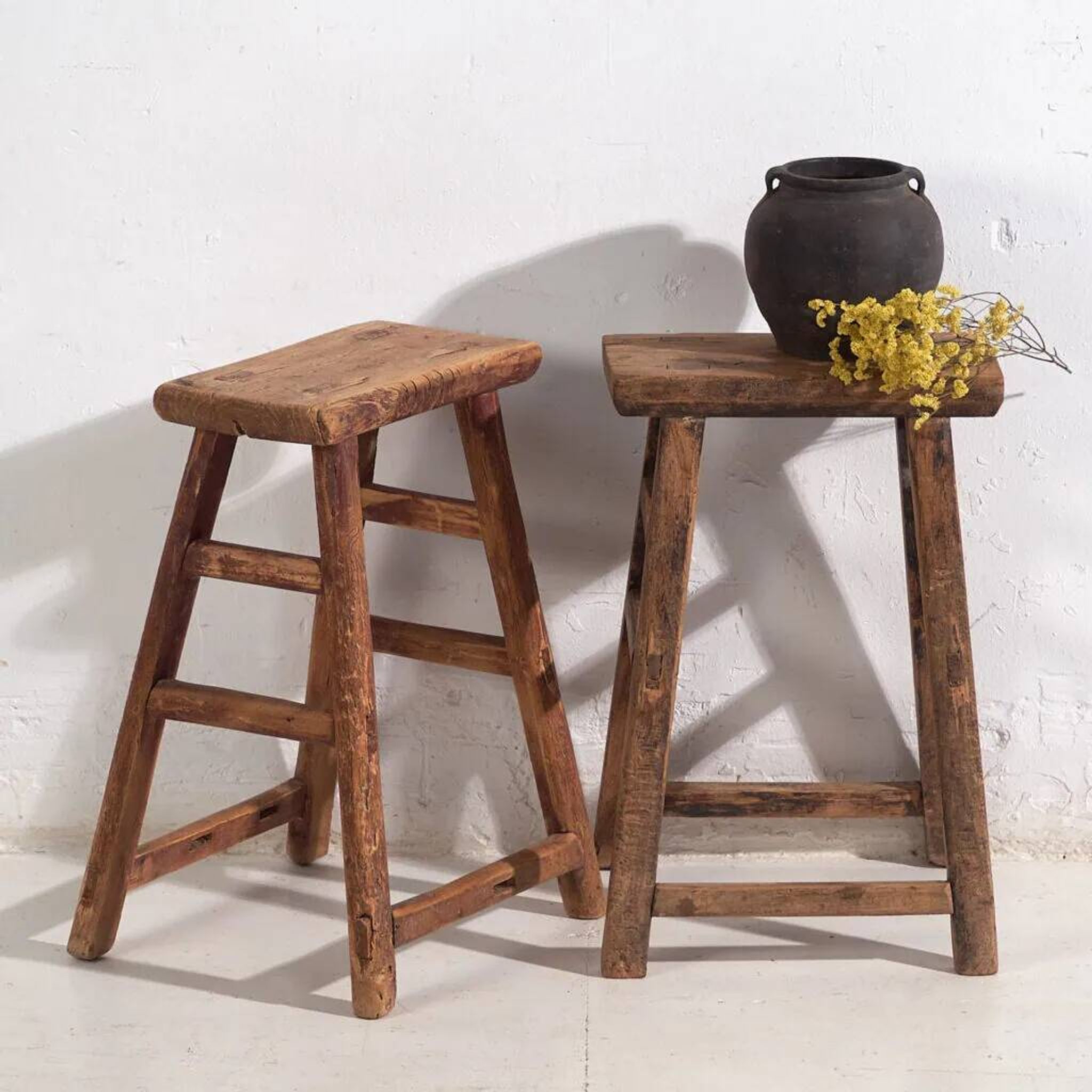 Antique Eastern stools (circa 1900). Set of 2 pieces