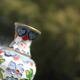 Two small vintage cloisonné enamel vases with Asian floral decoration.